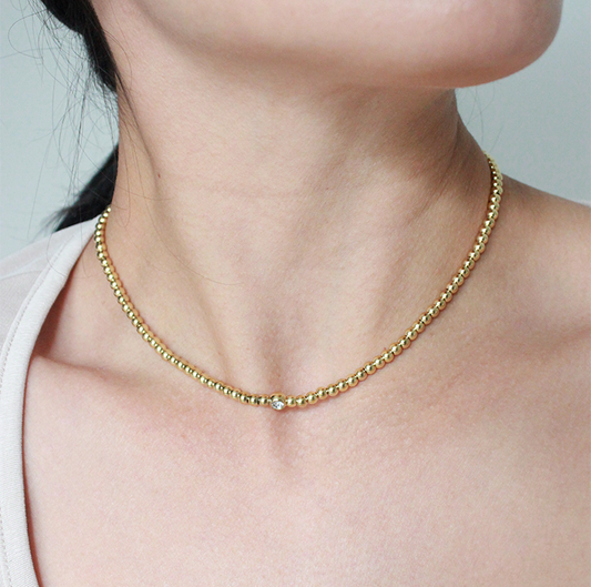 Collar esferas brillo gold