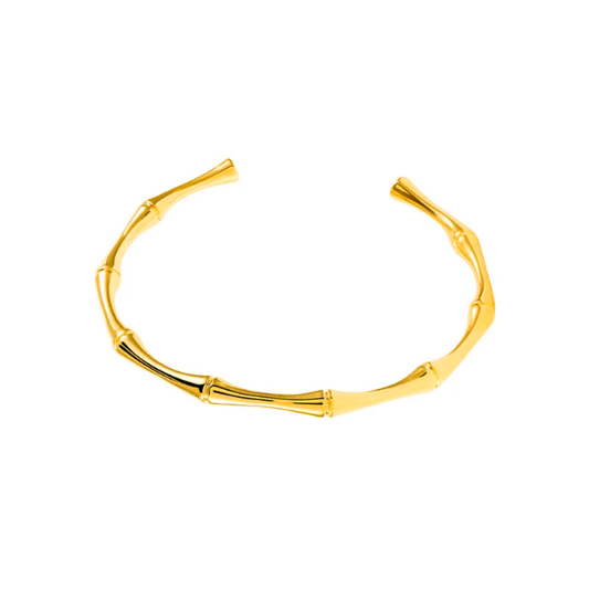 Pulsera brazalete bones con acabado en oro de 18kt