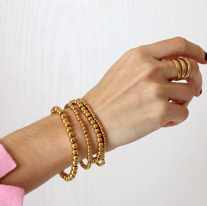 Set de pulseras esfera gold