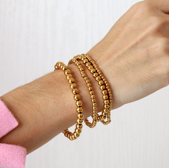 Set de pulseras esfera gold